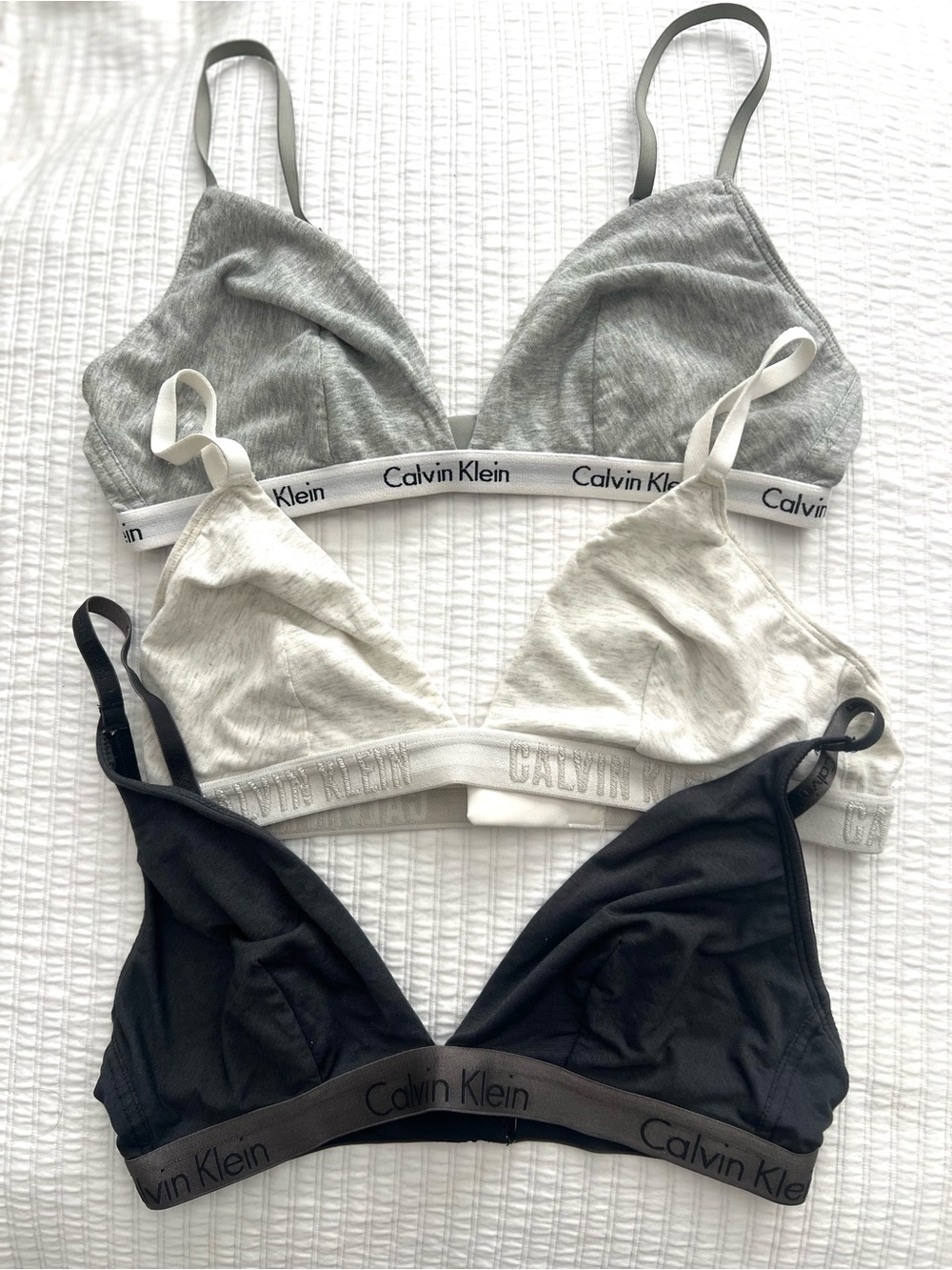 Calvin Klein Trio Triangle Bralettes in Gray, White & Black